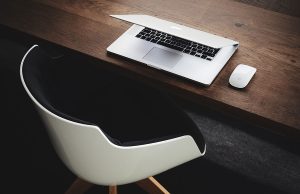 The hand rail is going a little faster than the moving sidewalk.